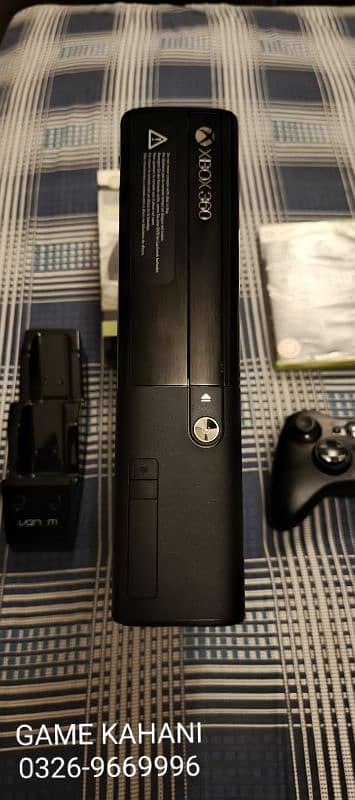 XBOX 360E + 1 Genuine Controller 10/10 like new totally Sealed. 1