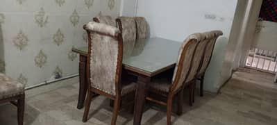 one large dining table and four chairs