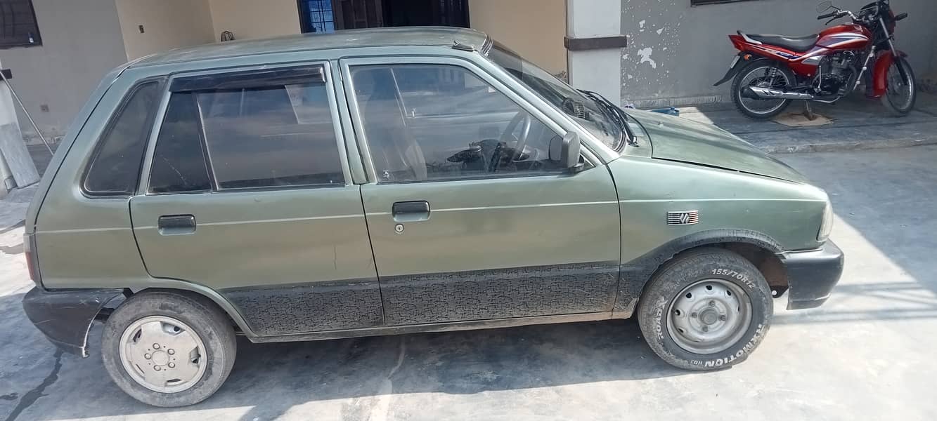 Suzuki Mehran VX 1993 good condition hai Lahore number hai 2