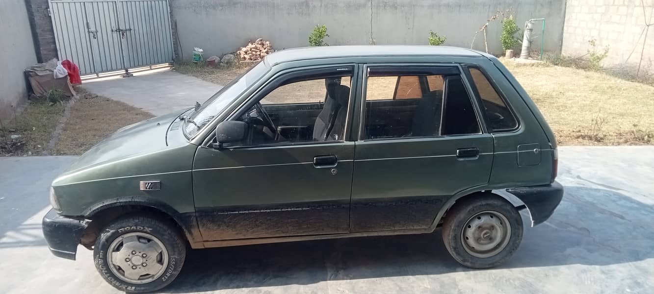 Suzuki Mehran VX 1993 good condition hai Lahore number hai 3