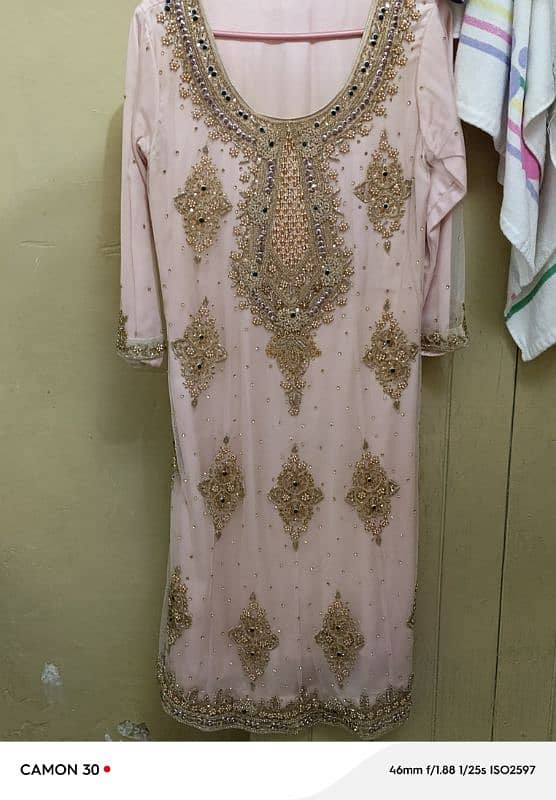 i am selling my net embroidery frock if anyone interested plz contact 0