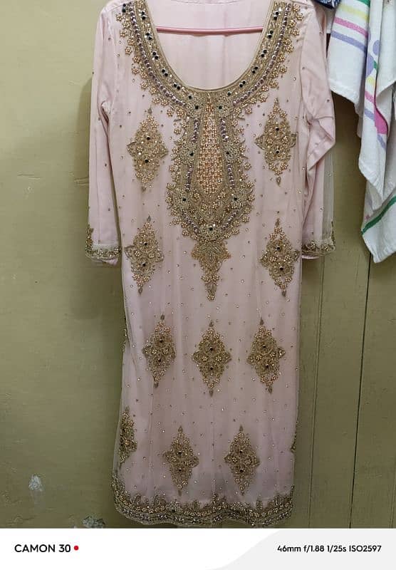 i am selling my net embroidery frock if anyone interested plz contact 1