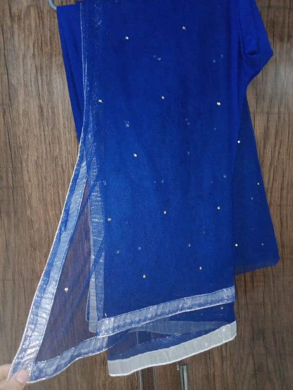 Blue long frock with trouser and net dupatta 4