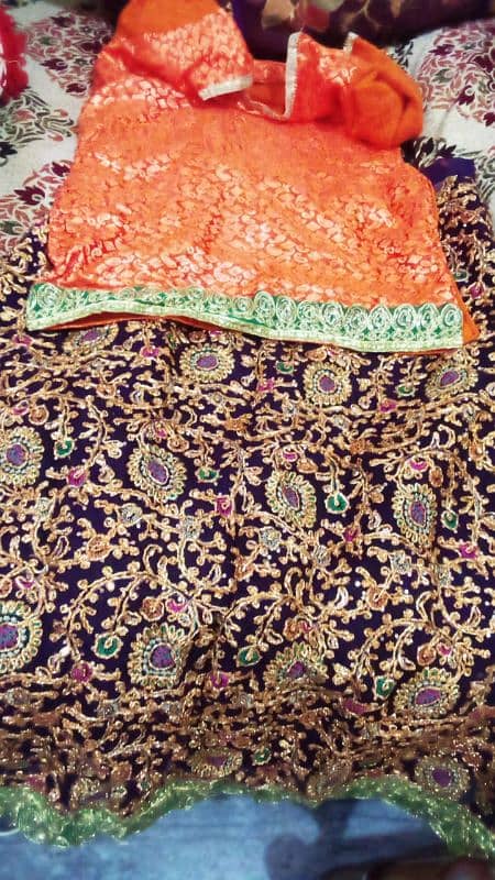 purple lehnga and purple dupata with orange shirt shirt size is 36 3