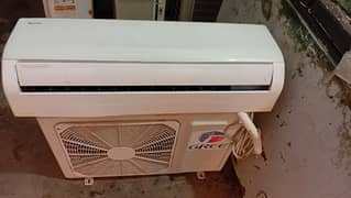 gree 1 ton DC Inverter A/C for sale.  running conditions.  child