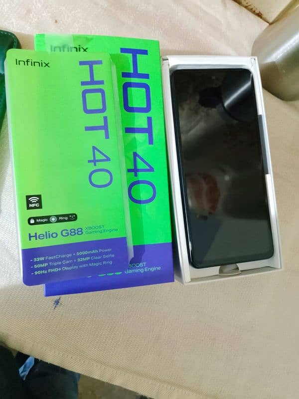 Infinix Hot 40. New condition with box and 4 back cover. 16/256gb 1