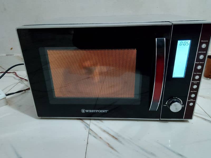 Westpoint 2 in 1 grill cooking microwave oven 44 liter size 1