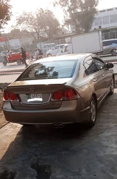 Look like Hot Honda civic rebon 125000 mailg sirf ok car ?