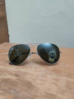 Sunglasses Ray ban and Prada Company