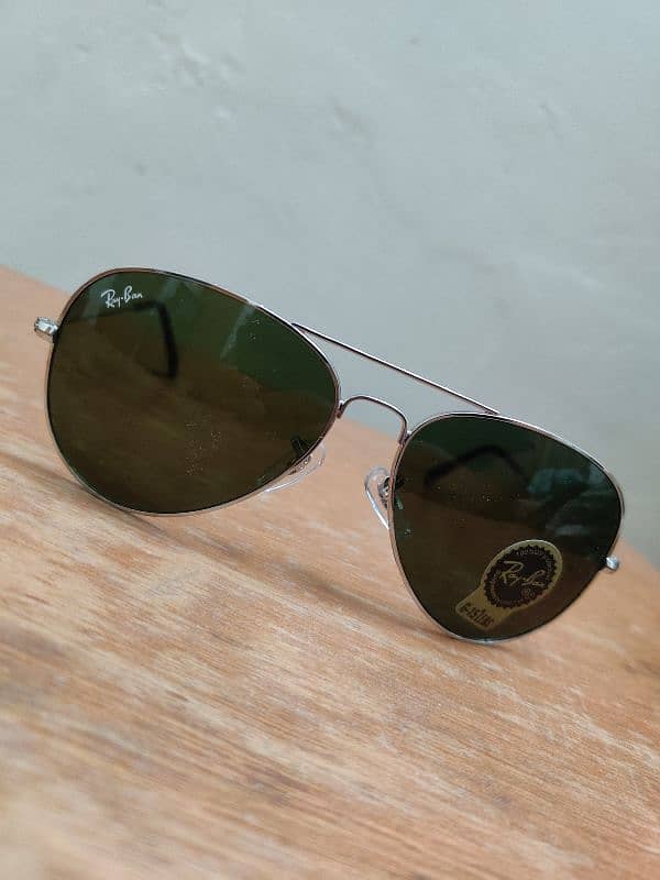 Sunglasses Ray ban and Prada Company 3