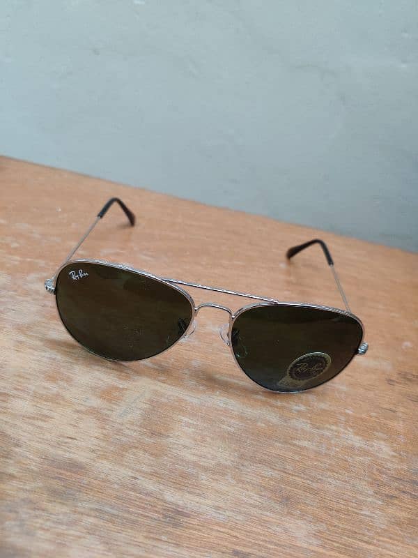 Sunglasses Ray ban and Prada Company 4