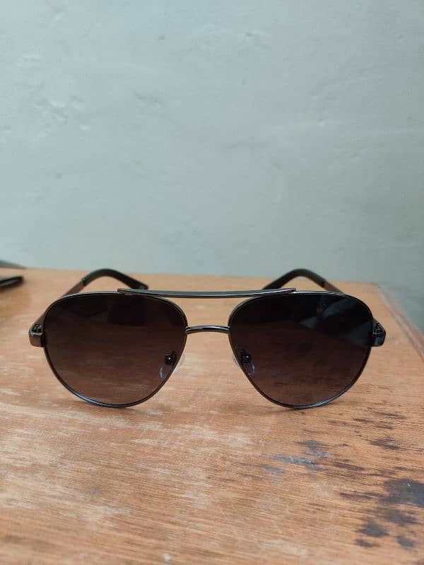 Sunglasses Ray ban and Prada Company 5