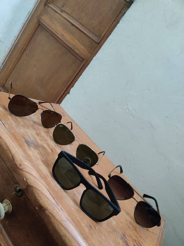 Sunglasses Ray ban and Prada Company 6