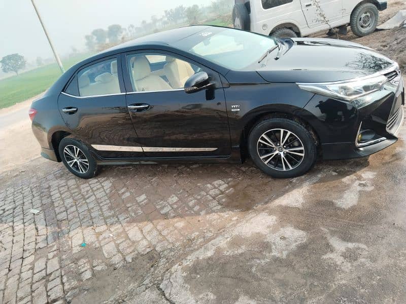 Toyota Corolla XLI 2018 total genuine X grandi bani hui h 7