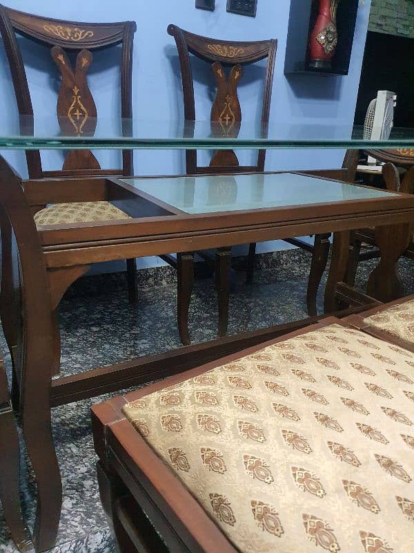 slightly used dining table with 6 chairs 1