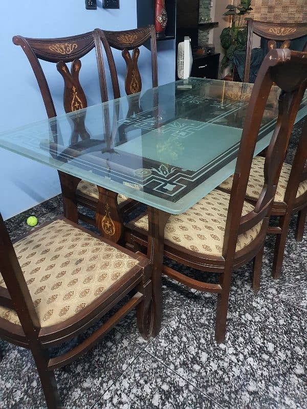 slightly used dining table with 6 chairs 4