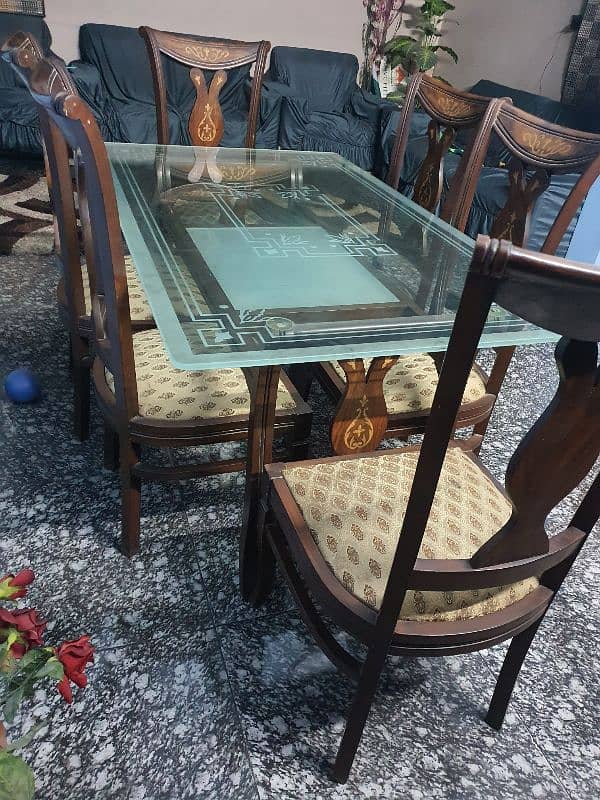 slightly used dining table with 6 chairs 5