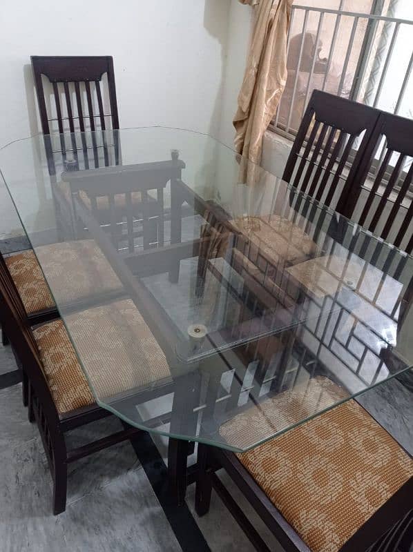 dinning table with 6 chairs. . . 2