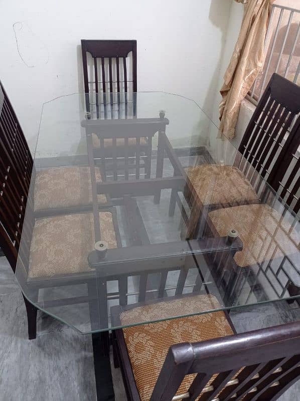 dinning table with 6 chairs. . . 3