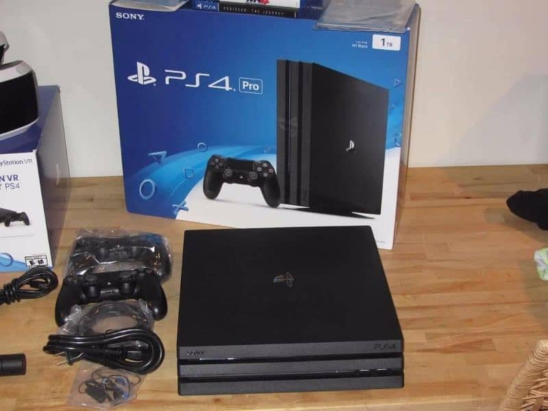 PS4 pro 1tb Game with complete box for sale with 2 controller 0