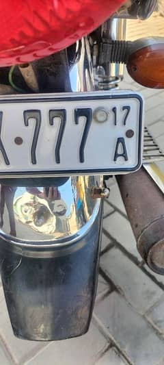 Honda 125 bike golden number