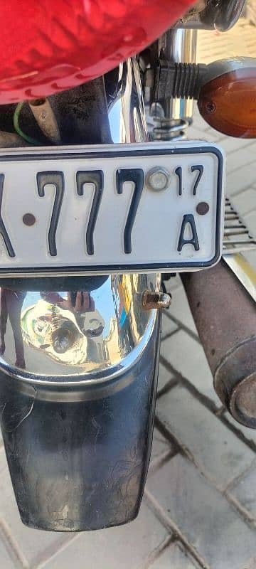 Honda 125 bike golden number 0