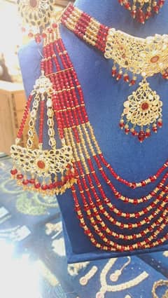 kundan with red and golden combination bridal set