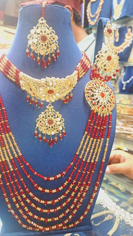 kundan with red and golden combination bridal set 3