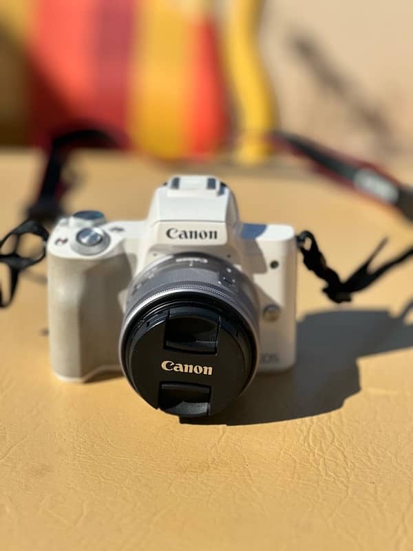 canon eos m50 (just 3-4 times used) with 2 batteries, 2 chargers,) 1