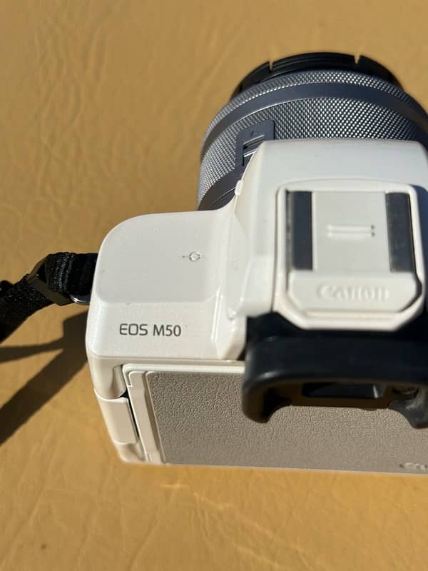 canon eos m50 (just 3-4 times used) with 2 batteries, 2 chargers,) 5