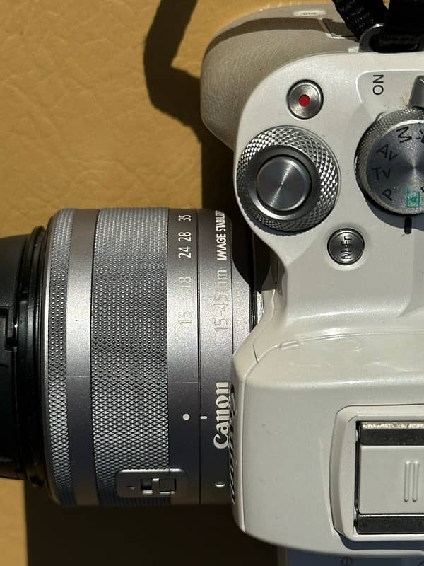 canon eos m50 (just 3-4 times used) with 2 batteries, 2 chargers,) 9