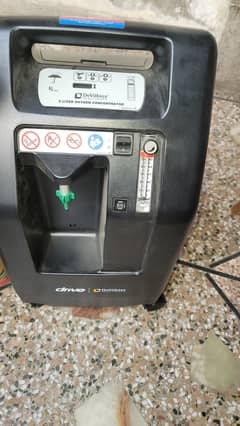 De vilbis Oxygen concentrator with cylinder