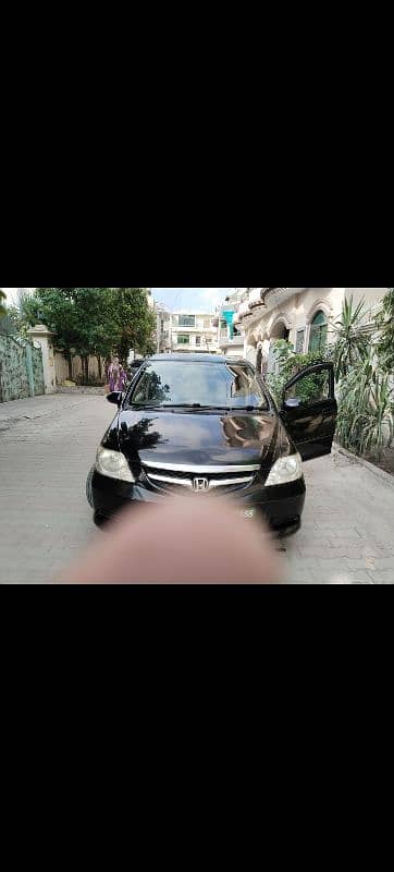 Honda City IDSI 2006/2007 ,please description par kr pir call Karen 8