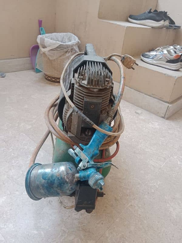 Italy original automatic Air compressor for sale with gun and pipe 1