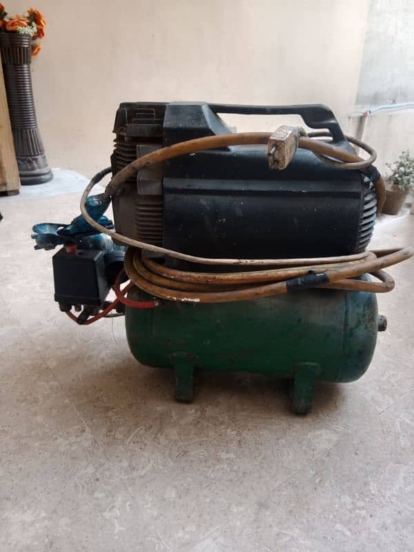 Italy original automatic Air compressor for sale with gun and pipe 3