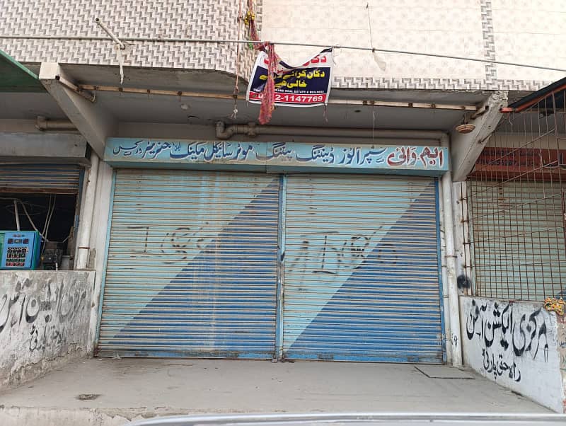 Commercial located shop for sale at prime location of surjani town T facing 0