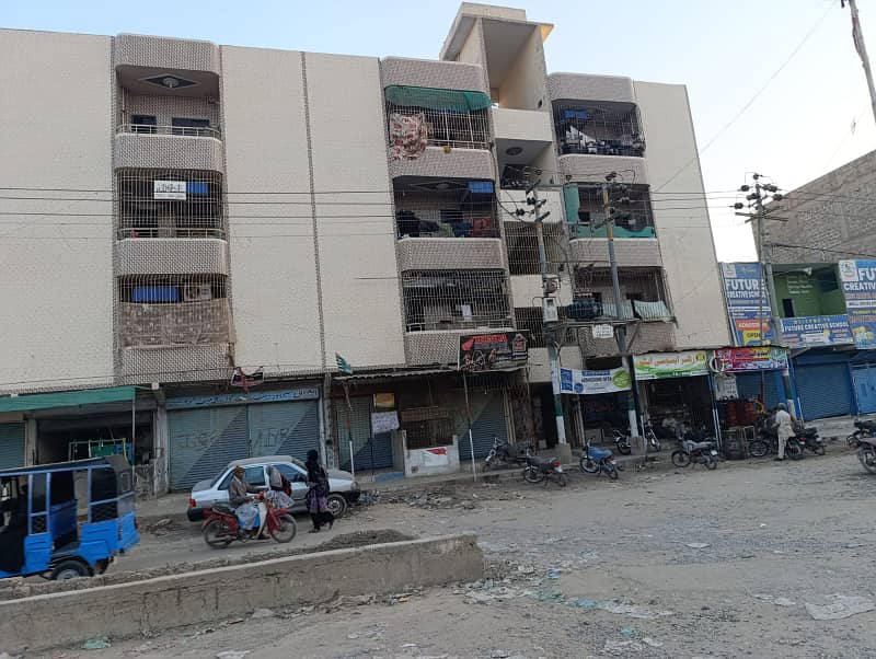 Commercial located shop for sale at prime location of surjani town T facing 3