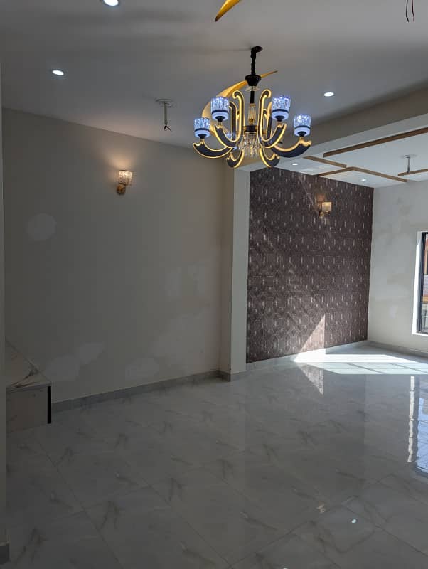 Brand New Modern 5 Marla House for Sale Nasheman Iqbal Phase 2! This stunning property offers: read description 6