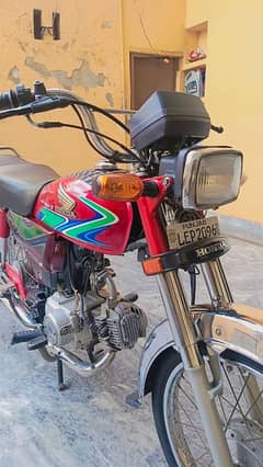 Honda CD 70 red color