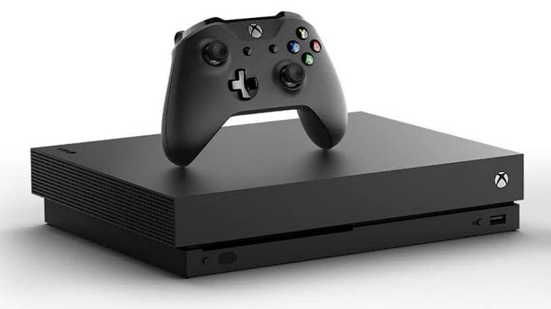 XBOX ONE X 1 TB SLIGHTLY USED WITH BOX 2