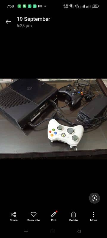 Xbox 360 with controller 14