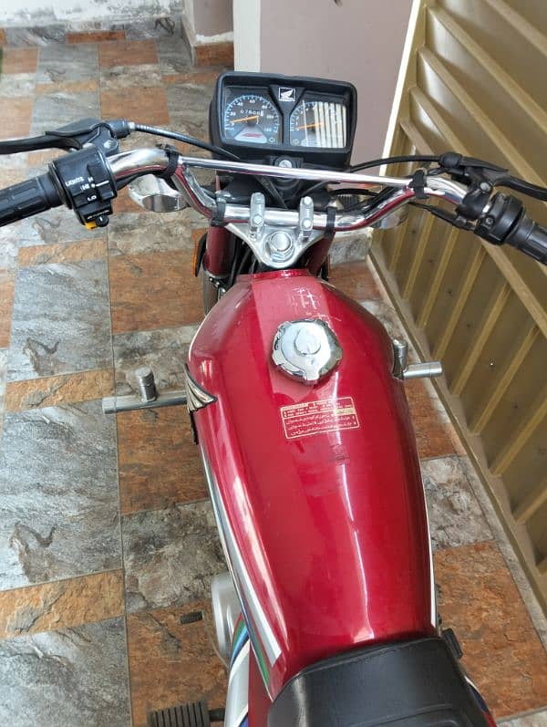 Honda 125 red coulear 0