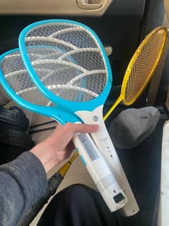 Two mosquito racket and one tennis