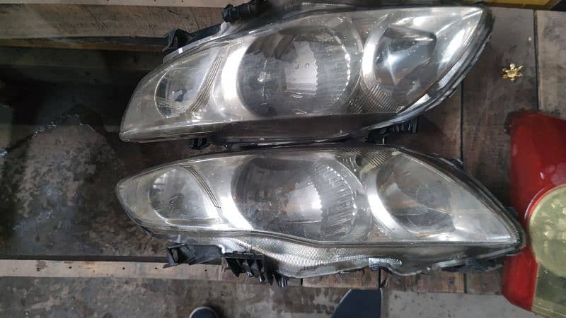 toyota corolla 2009 original lights avaliable 4