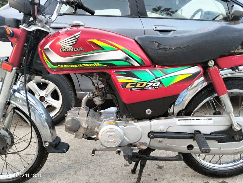 Honda CD 70 2022 last 9 month totally genuine condition Karachi number 1