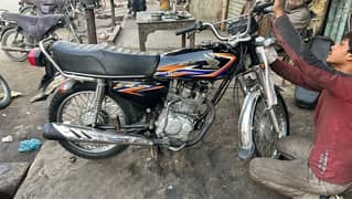 honda 125 multan number