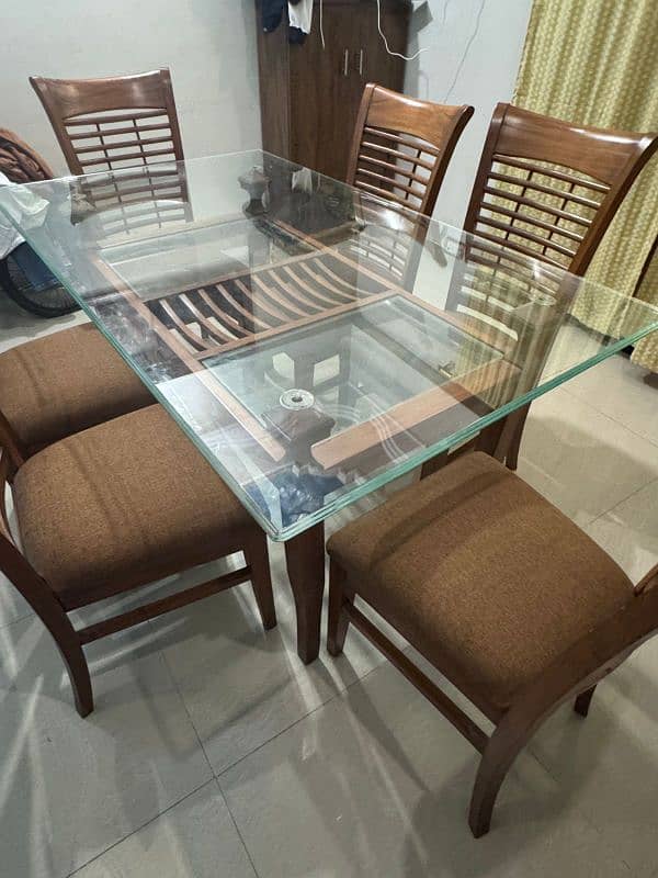 a Square 6  chair Dining Table Made up of Wood and Glass 5