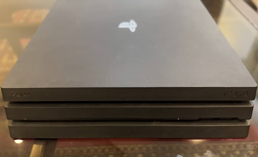 Sony PS4 Pro - 1TB with 2 Controllers 1