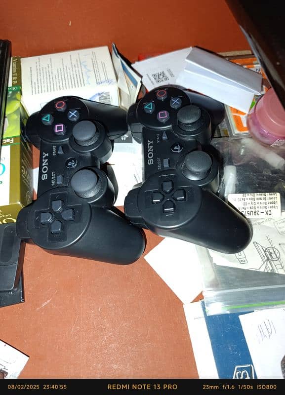 PS3 slim 500gb with 2 wireless controller 1