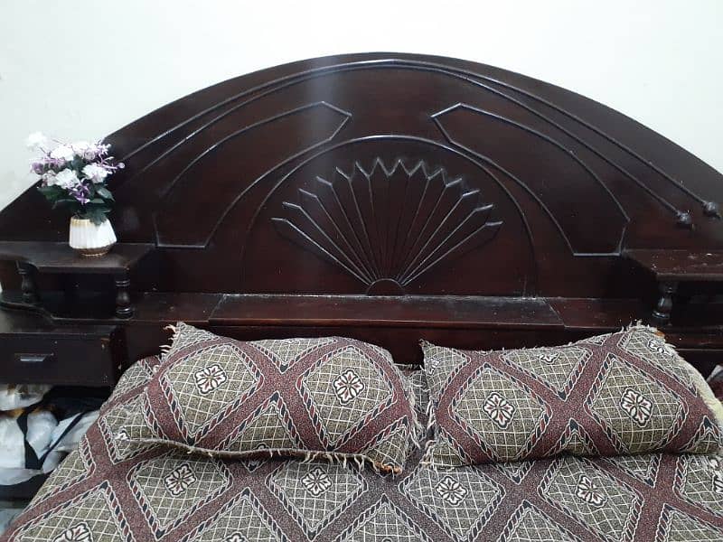 Double bed with attached side tables 0